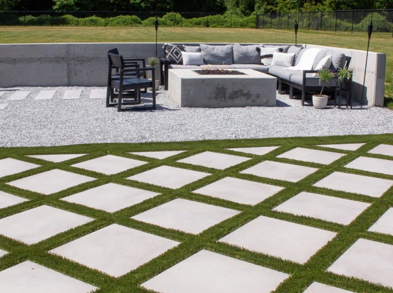 Taryn Whiteaker Designs backyard project with a diamond-grid PaverTurf patio